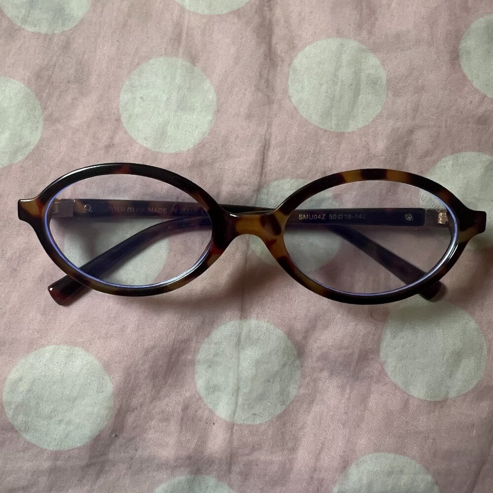 Miu miu glasses oval blue light glasses